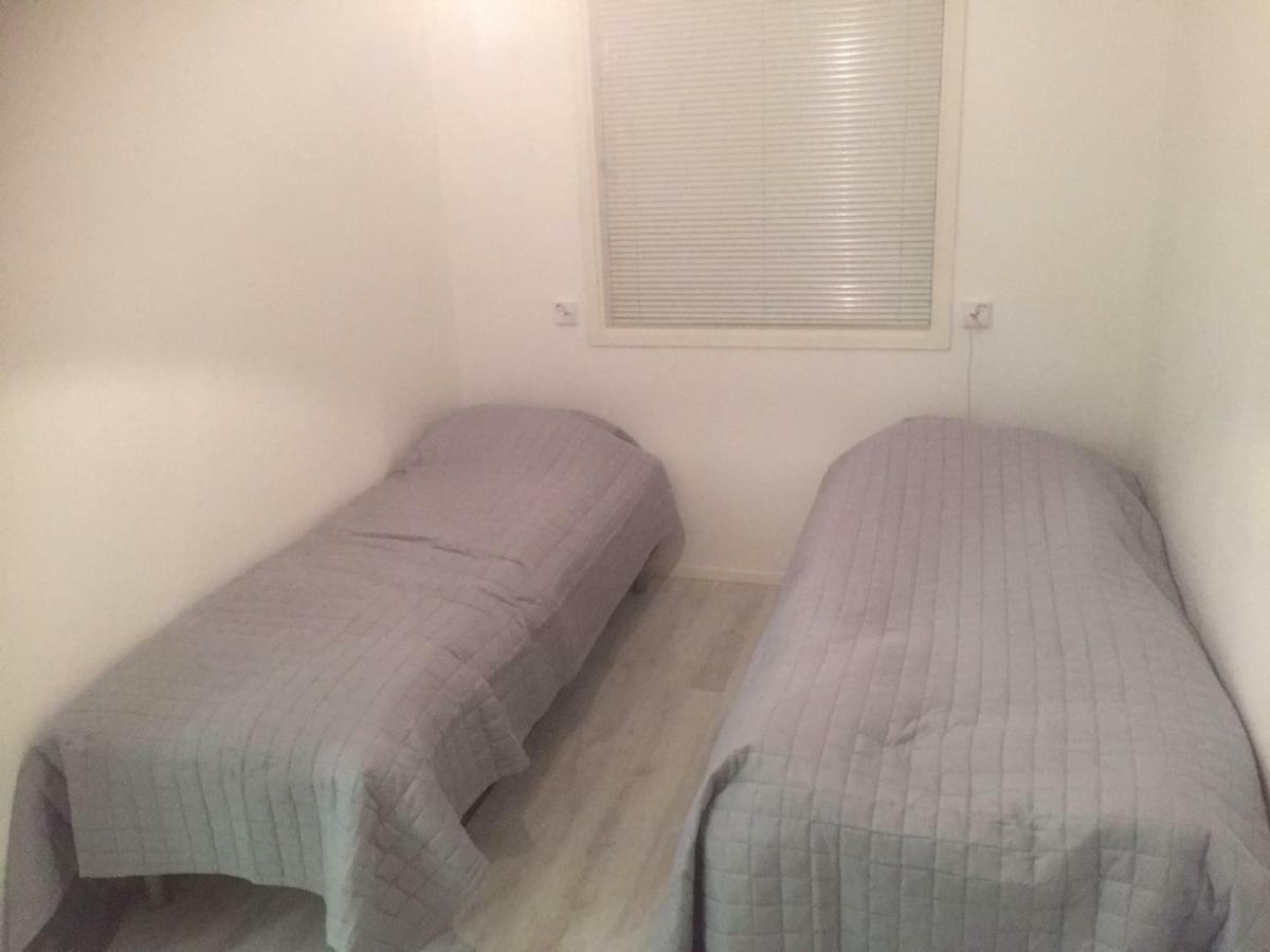 Aurora Apartment อีนารี ภายนอก รูปภาพ